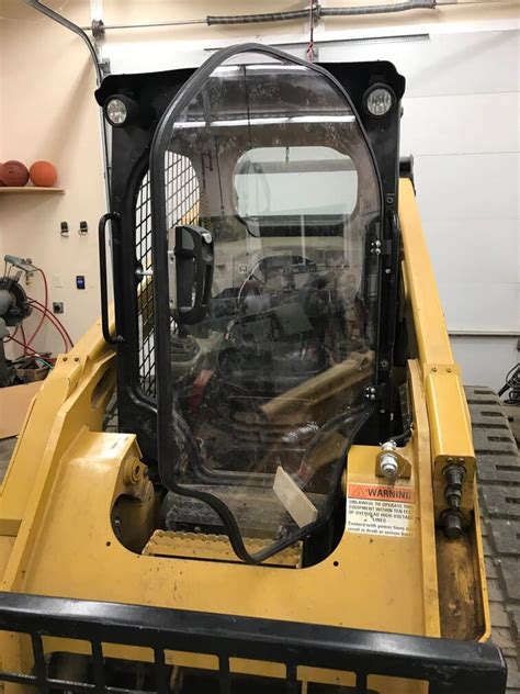 caterpillar skid steer door original equipment|caterpillar side window kit.